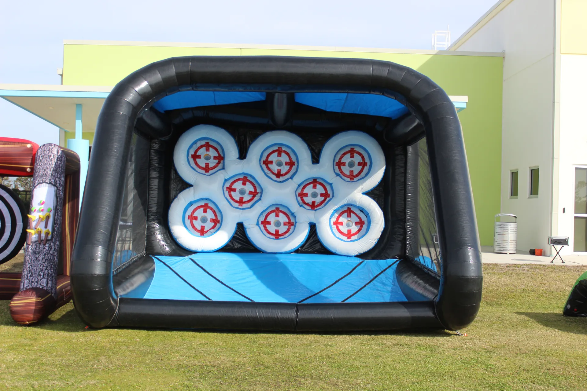 Guests enjoying a target game at a Stealth Elite Events event